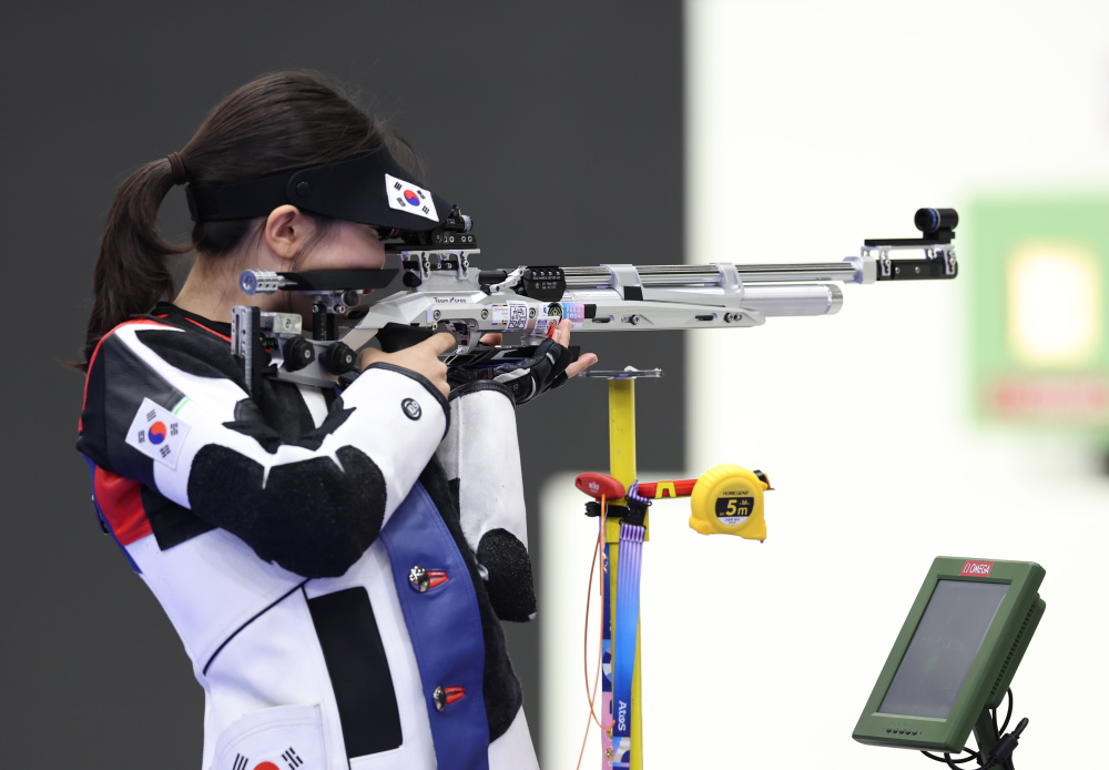 包含意大利选手夺得射击女子头金牌的词条